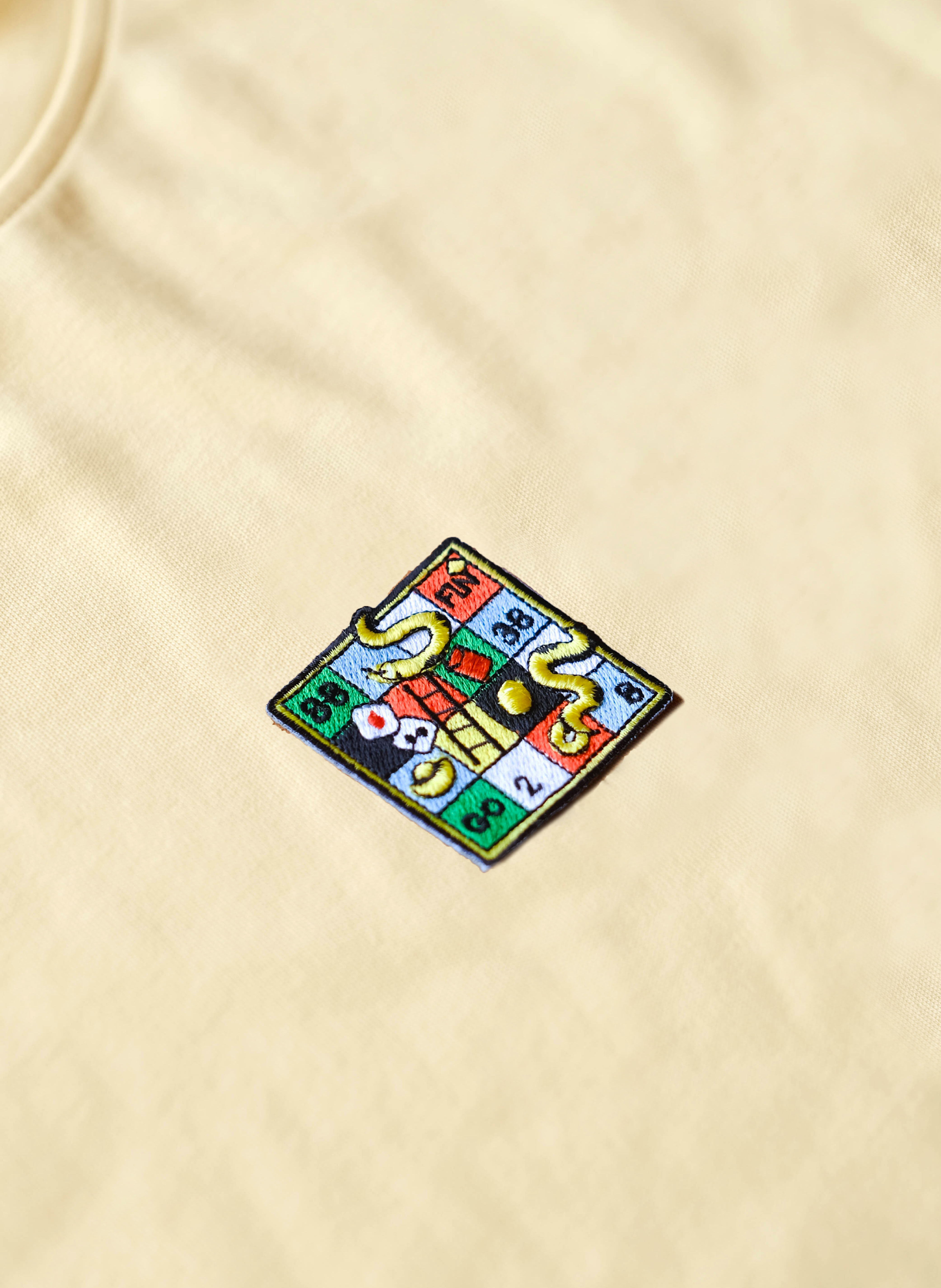 Snakes & Ladders Embroidery Tee (BEIGE)